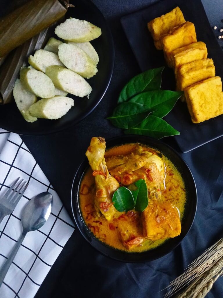 Opor Ayam "Traditional Indonesian Cuisine" served with fried tofu and lontong, Uses of Desiccated Coconut in Indonesian Cuisine