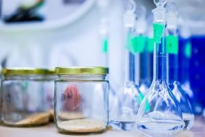 In powder mixing (e.g., for protein powders or drink mixes), a minute spray of MCT oil can be used to control dust, reduce particle segregation, and improve the cohesion of fine particles, making the powder flow more evenly and reducing waste and inhalation hazards